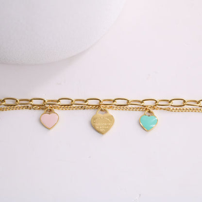 TF Double Chain bracelet with pink and blue heart